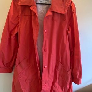 Burnt orange worn coat